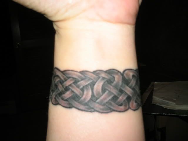 Celtic Tattoos When it comes to color, the artist used black and gray to 