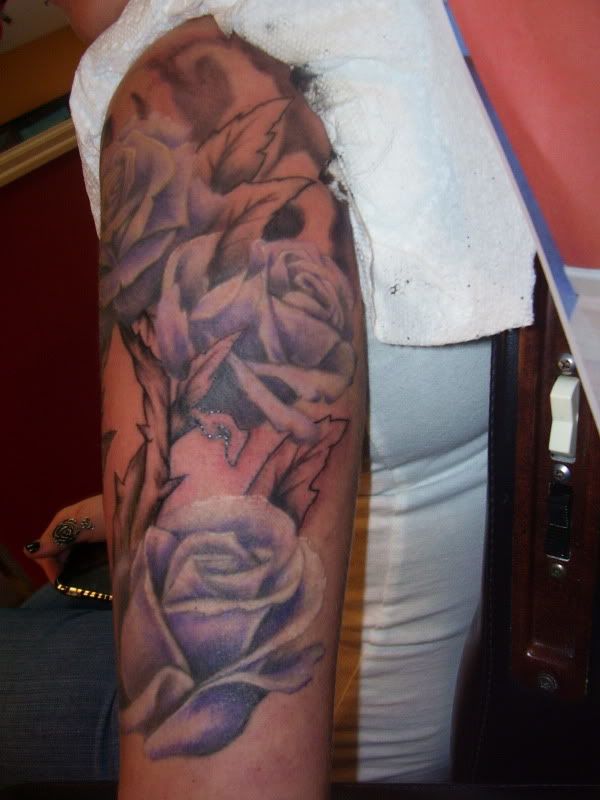 Looking for a singular rose sleeve tattoos We got it