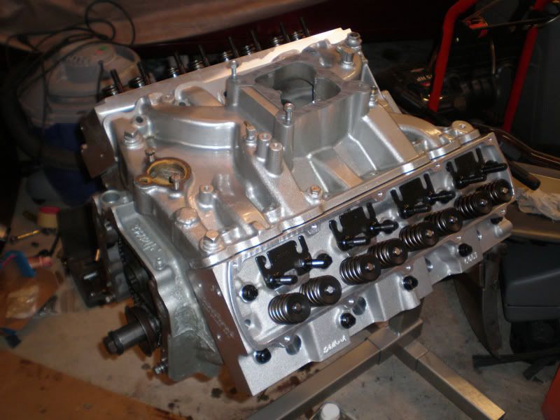 http://i29.photobucket.com/albums/c276/DmstcDisturbance/my%20cars/EngineBuild009copy.jpg