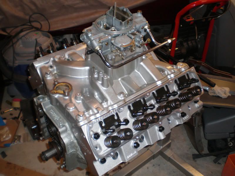 http://i29.photobucket.com/albums/c276/DmstcDisturbance/my%20cars/EngineBuild011copy.jpg